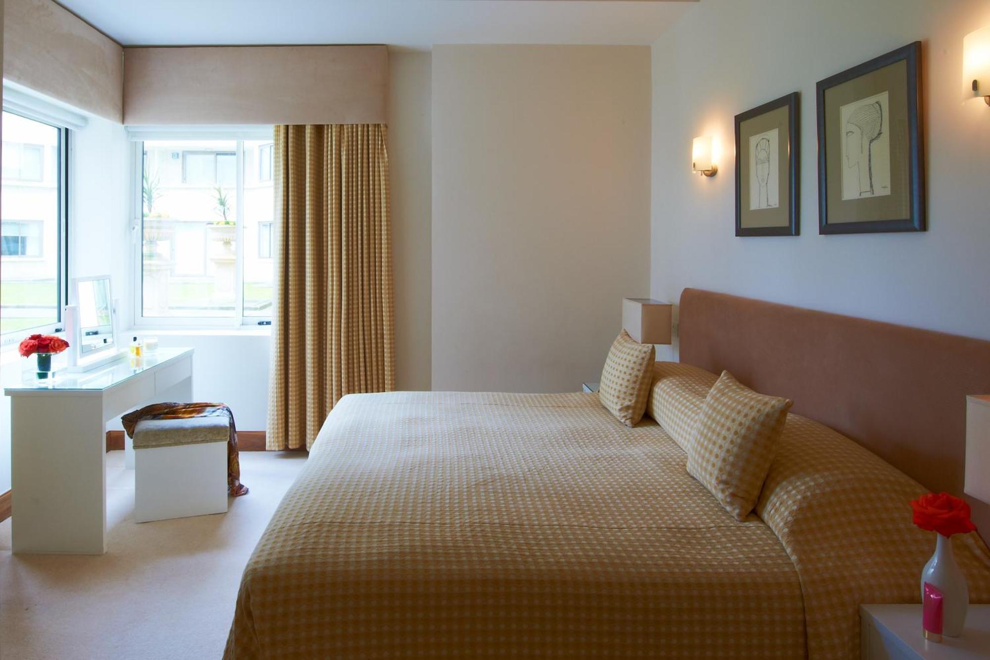 Deluxe Two-Bedroom Apartment with Garden View