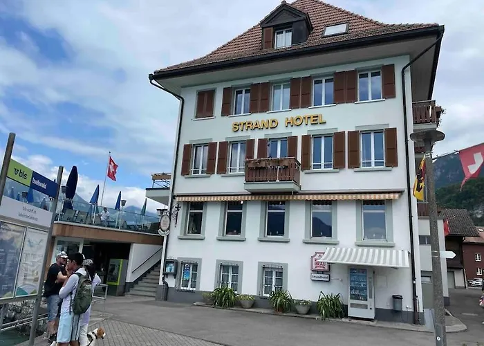 Romantic Swiss Alp Iseltwald With Lake & Mountains