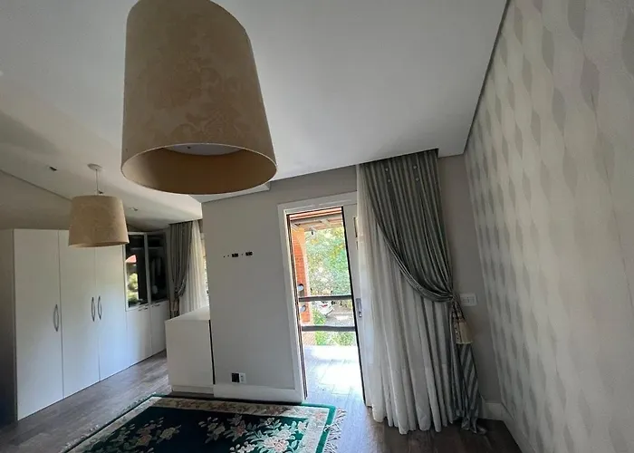 Casa pé na areia em praia paradisíaca