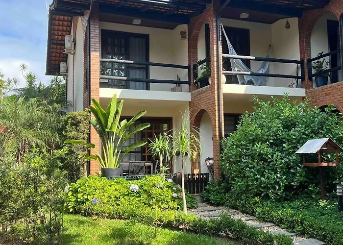 Casa pé na areia em praia paradisíaca