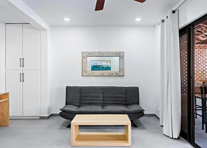 Modern Split-Level 2-Bedroom Condo With Pools, Terrace & Easy Beach Access