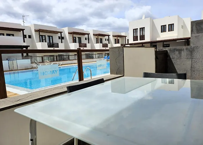 Duplex Noray vista a la piscina