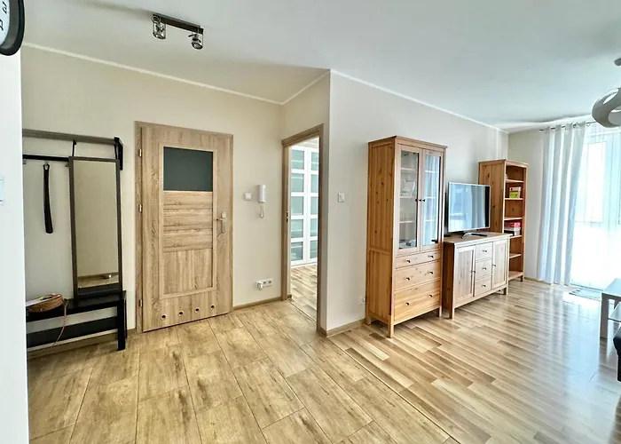 Nowoczesny Apartament: Centralna Warszawa z Garażem i Wi-Fi