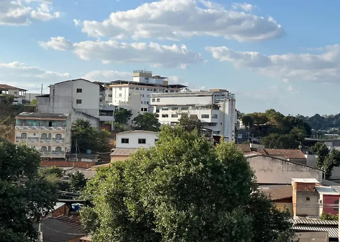 Flat com ar e varanda com linda vista para o Ibituruna - Vôo Livre 203