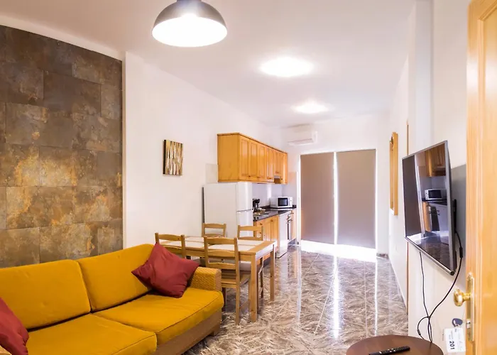 Apartamentos La Aldea Suites
