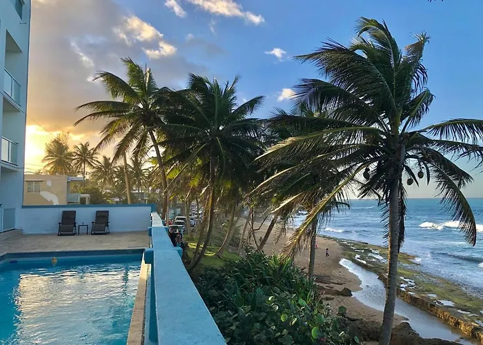 Coastal View Beach Front Apartment With Pool