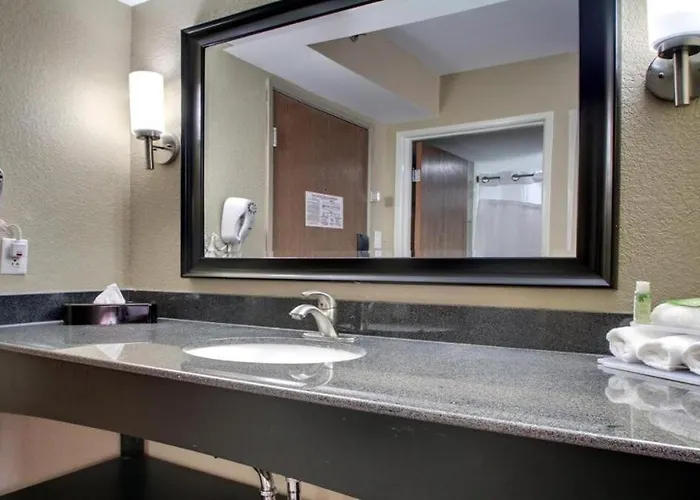 Queen Bed Hotel Suite 127