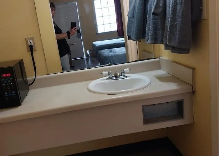 Gated 2 Double Beds Hotel Room 122