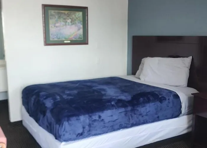 Queen Bed Hotel Room 227