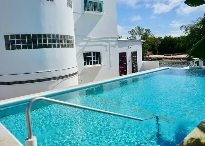 See Belize Waterside Sea View Family Apt For 6 With Kitchen, Balcony, Pool & Overwater Deck Near Airport, Restaurant, Bar & Casino