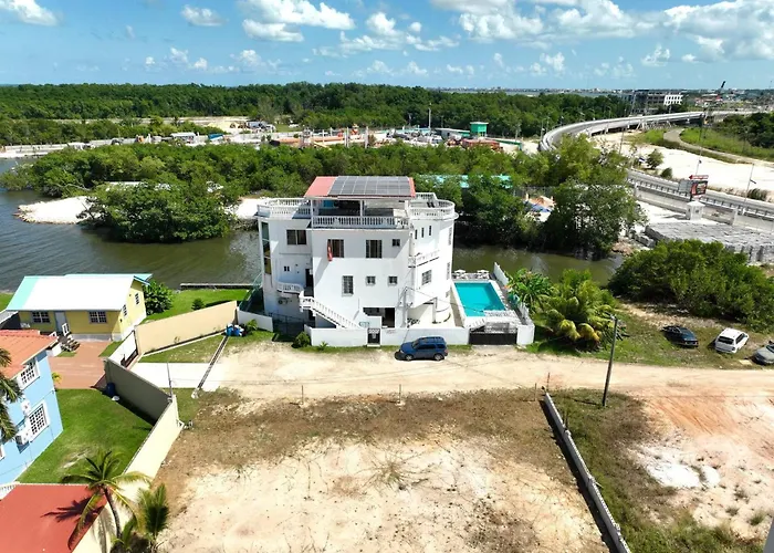 See Belize Waterside Sea View Family Apt For 6 With Kitchen, Balcony, Pool & Overwater Deck Near Airport, Restaurant, Bar & Casino