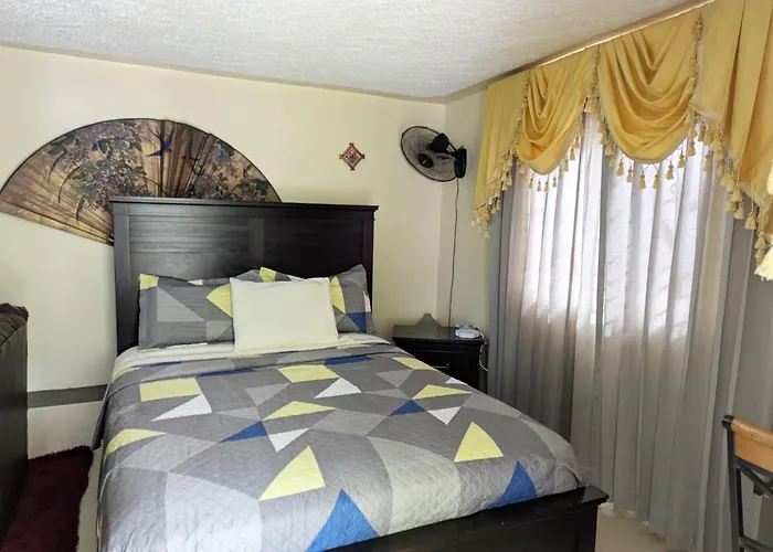 Oasis Living Getaway In Mandeville, Manchester