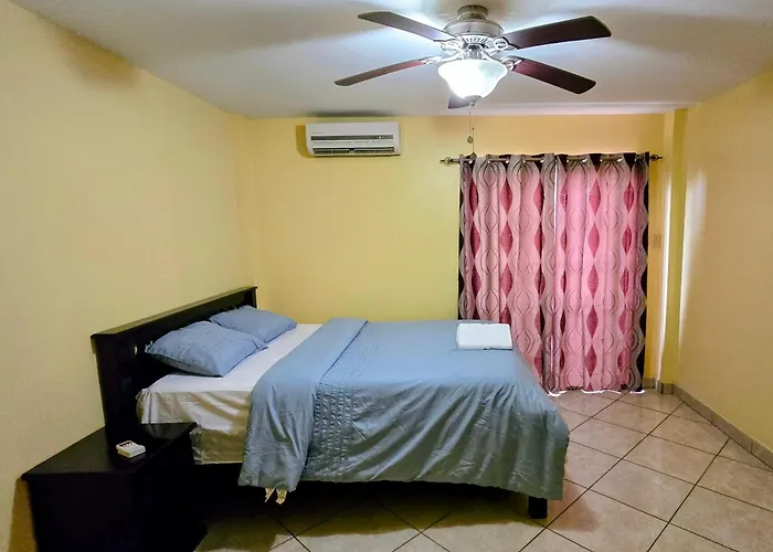 Paradise Suites , Hotel And Golf Cart Rental