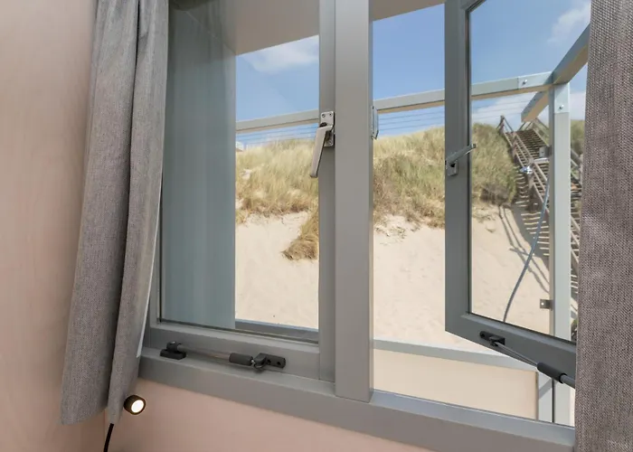 Hotel met uitzicht: Welcome in - Slaapstrandhuisje 67-68 Dishoek