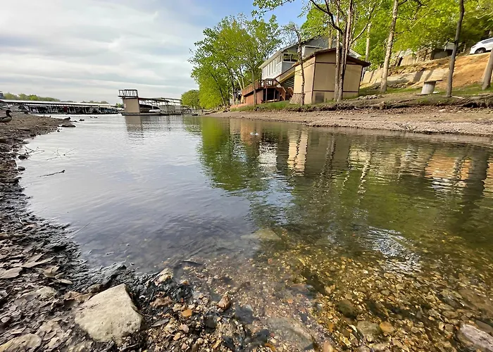 Ground Floor! Lakefront! Pool! ! Convenient Fishing! Stairs Optional!